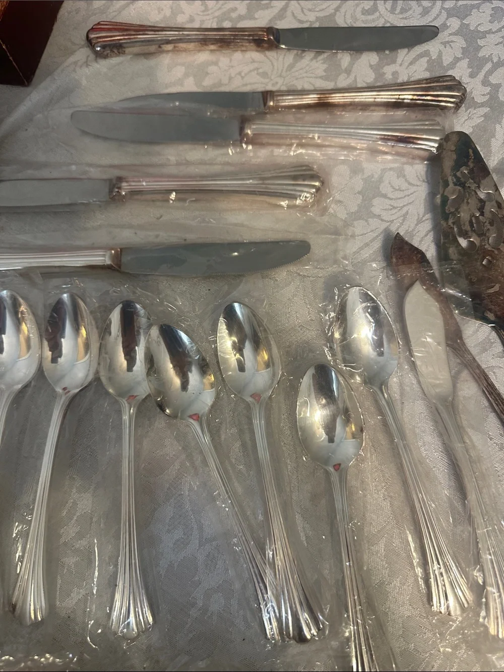 Classic Silver-Plated Flatware Set in Red Velvet Case. Used and factory sealed.